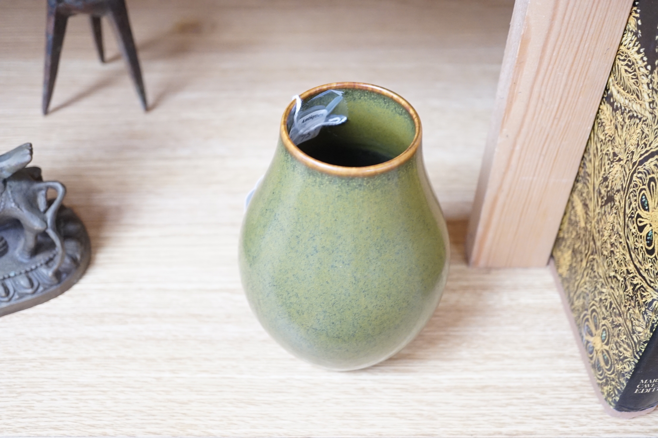 A Chinese tea dust glazed pear-shaped vase, 14cm high